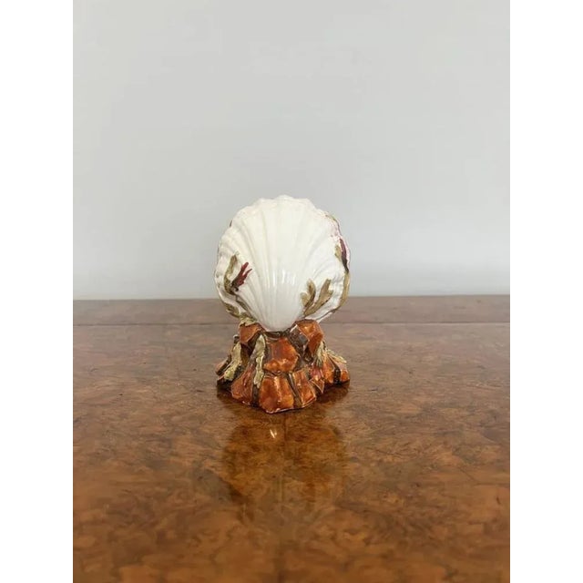 Quality antique Victorian porcelain clam vase having a quality antique Victorian porcelain clam vase hand painted in...