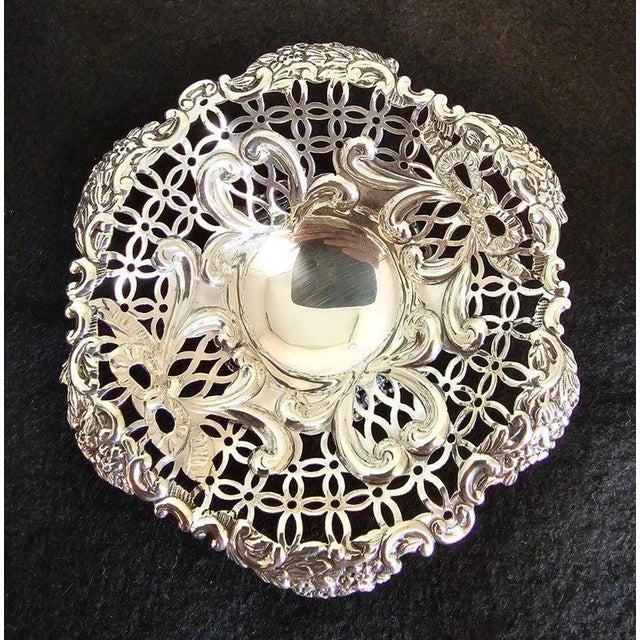 A fine pair of late Victorian sterling silver trinket or bon bon dishes by the celebrated London silversmith William...