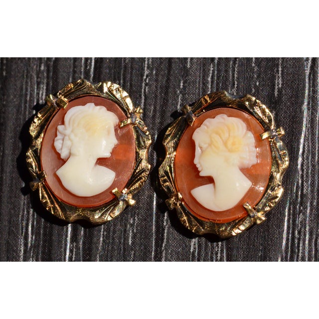 The Matancitas: Ladies Antique 14K Gold Italian Carved Cameo Stud Earrings. Crafted in 14 karat yellow gold, these antique...