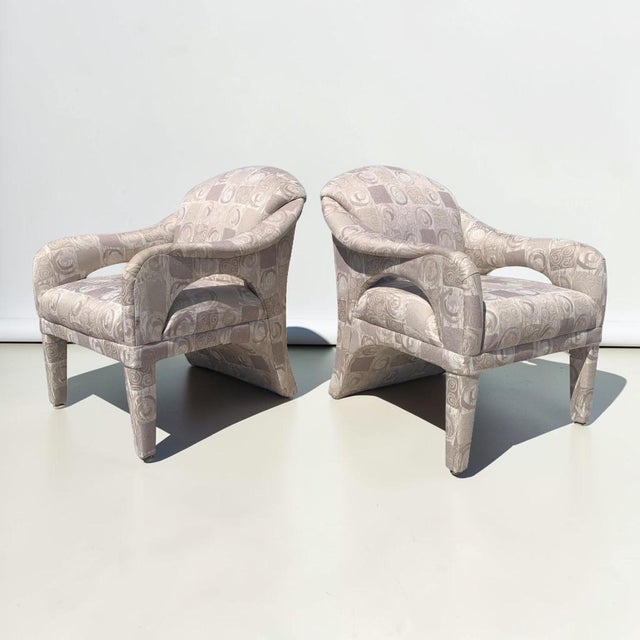 Beautiful pair of vintage postmodern sculptural lounge chairs in the style of Vladimir Kagan by Carson’s Furniture. The...