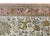 An incredible mid-20th century 100% hand-woven silk Persian Qum rug depicting myriad animals including deer, rabbits,...