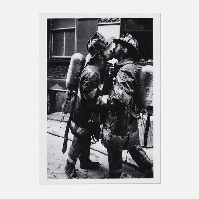 Jill Freedman Kissing FDNY 1976, black & white photo on Kodak Endura, Signed. Image also known as ‘Brotherly Love.” This...