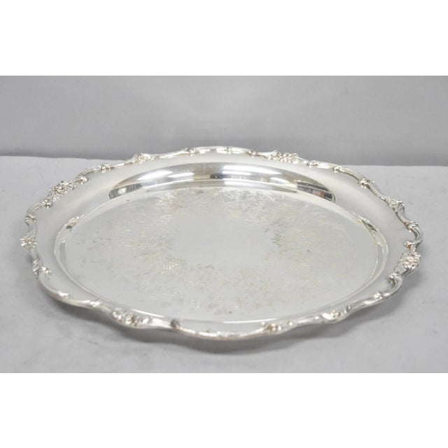 Vintage WM Rogers Wellington 1171 Round Silver Plated Etched Floral Platter Tray. Circa Mid 20th Century. Measurements: 1"...