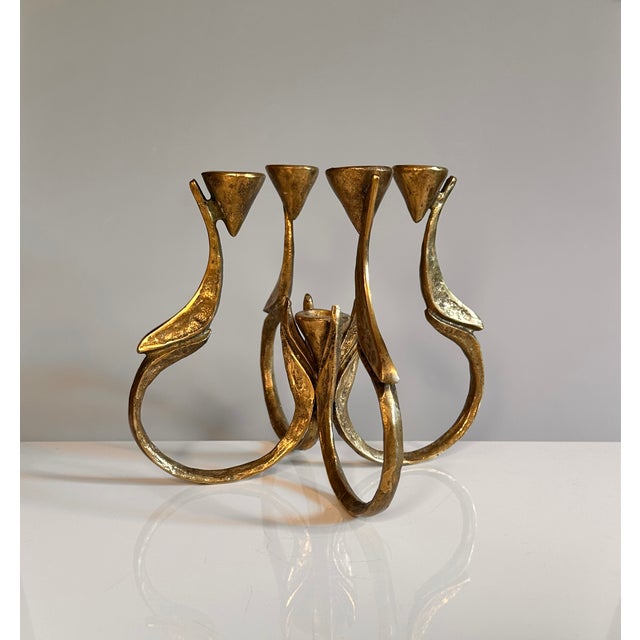 An impressive table candleholder in floral design, created by the renown German metal artist Michael Harjes during the...