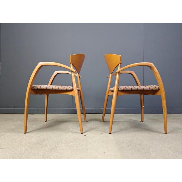 Vintage wooden dining chairs with blue velvet seats. Designed and manufactured in spain, these timeless armchairs, dining...