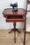 This gorgeous vintage tripod table is sure to impress in a mid 20th-century home setting. Displaying a gorgeous mahogany...