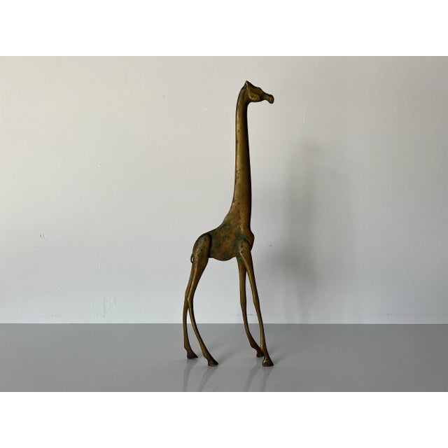 Available for sale this amazing Vintage art handmade solid brass decorative giraffe sculpture. C,1970's. This vintage...
