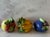Set of 3 vintage hand painted Italian majolica art lidded dishes in the shape of different fruit. This set includes a...