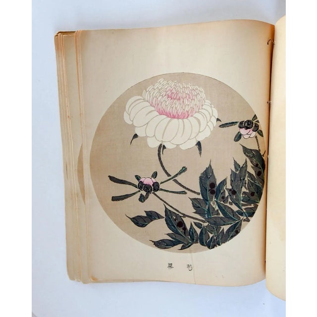Vintage bound volume of 25 Japanese block prints on paper. Multi color round print area 9.25" dia., each could be framed...
