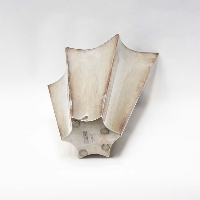 A silver plated vase designed by Lino Sabattini. Made in Italy ca.1960 stamped underneath I have official proof of...