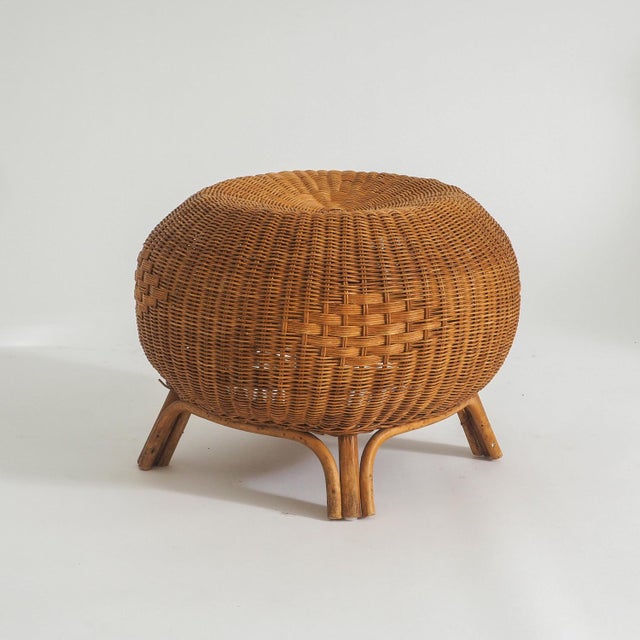 Introducing a versatile piece that seamlessly blends functionality with aesthetic appeal. This wicker pouf, doubling as a...