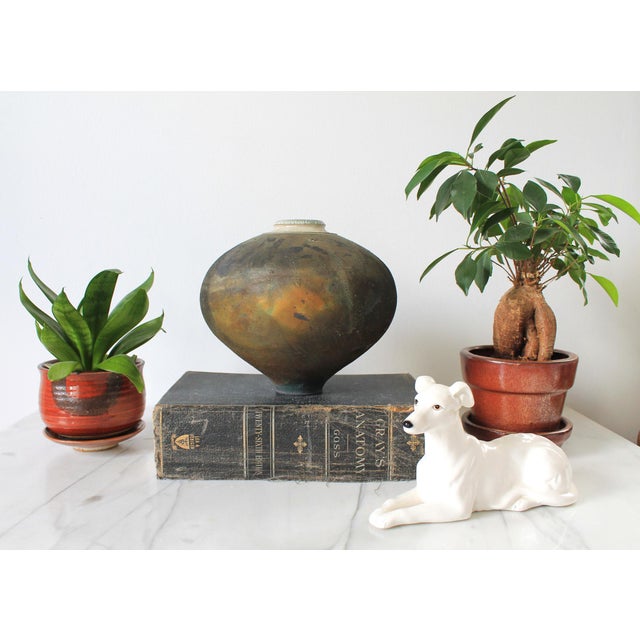 Vintage raku pottery bulbous form vase. Signed by the artist and dated 1986. Some age wear to finish. Pictured. No chips...