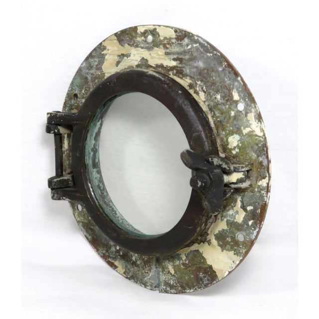 A Small Size Antique Boat - Ships Porthole. Very Heavy Solid Cast Brass with Original Glass window. PLEASE NOTE If you...