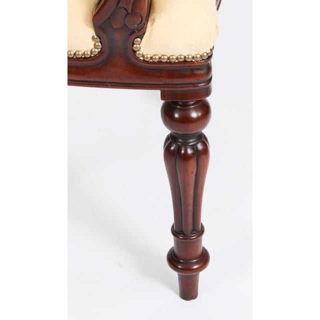 This is an absolutely fantastic vintage set of twelve balloon back dining chairs dating from the late 20th century. These...