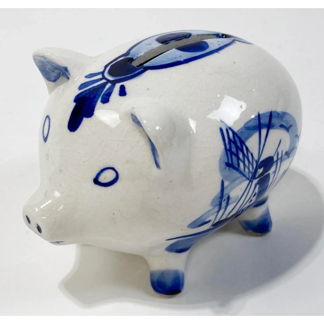 Store your rainy day change in style! Vintage piggy bank with the lovely Delft blue and white floral and windmill pattern...