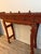 This item is a traditional, handmade Chinese red lacquer altar table, featuring intricate carvings and a distressed...