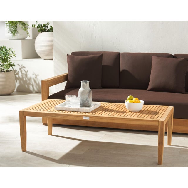 Introducing the Samoa Brazilian Teak Patio Coffee Table in soothing Natural color, a flawlessly crafted outdoor piece....