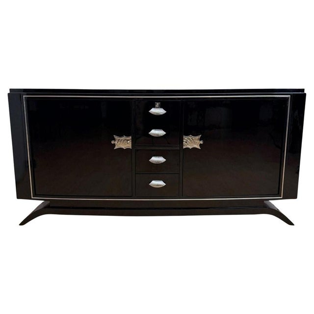 Wonderful, elegant Art Deco Sideboard or Buffet in black piano lacquer and chrome, from France, circa 1930. Walnut body...