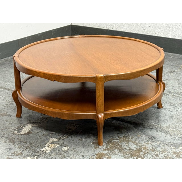 Design Plus Gallery presents a Mid 20th Century French Provincial Style Round Coffee Table. This round two-tier coffee...