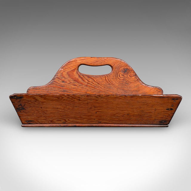This is an antique country ladies garden trug. An English, pitch pine outdoor tool carry, dating to the Victorian period,...