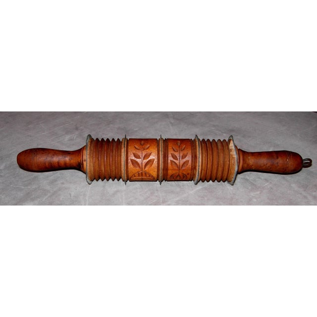 Offered here is an Antique Rolling Pin for marking gingerbread and pastry. The rolling pin measures 11 ¾ inches long with...
