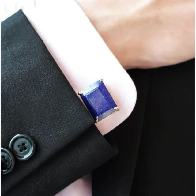 The Hassan Cufflinks are a refined blend of vintage charm and minimalist design, showcasing rectangular semi-precious...