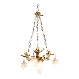 French 19th Century Gilt Metal Chandelier with Three Cherubs Holding the Lights For Sale