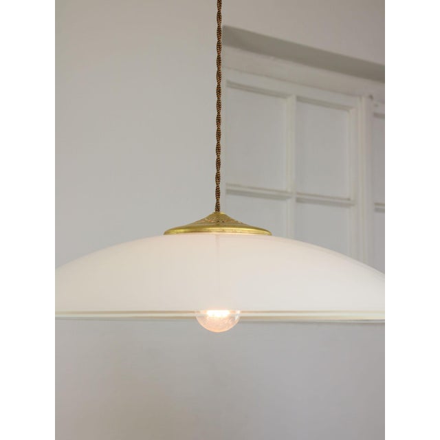 Total height of the lamp is adjustable, length of the cable alone is 140cm and can be shortened to your preference. Takes...