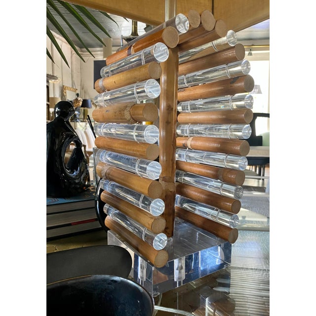 Mid Century Modern Lucite and bamboo reed table lamp by Shirley Ritts for Ritts Co. Los Angeles. This sculptural Palm...