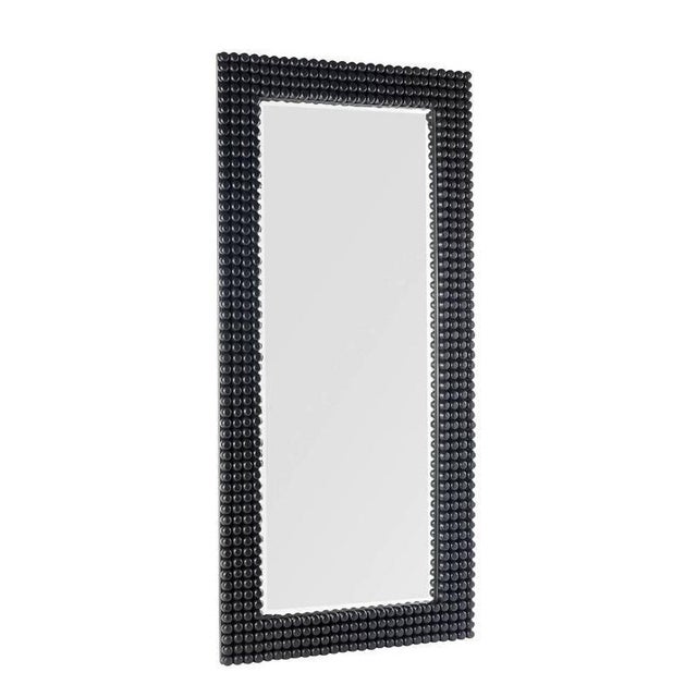 Filled with visual and tactile textures, the Paxton Mirror is a beautiful work of craftsmanship. Every single knob is hand...