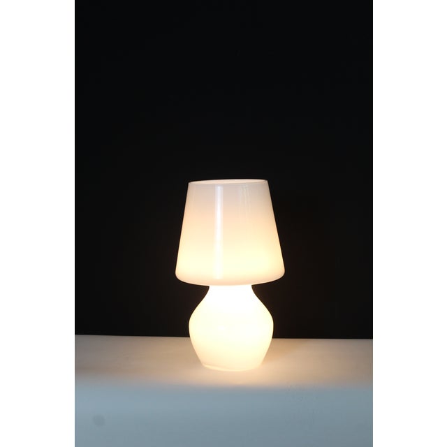 Sculptural style.. Similar to Max Ingrand's iconic design for Fontanaarte.. Frosted blown glass. Simple in design....