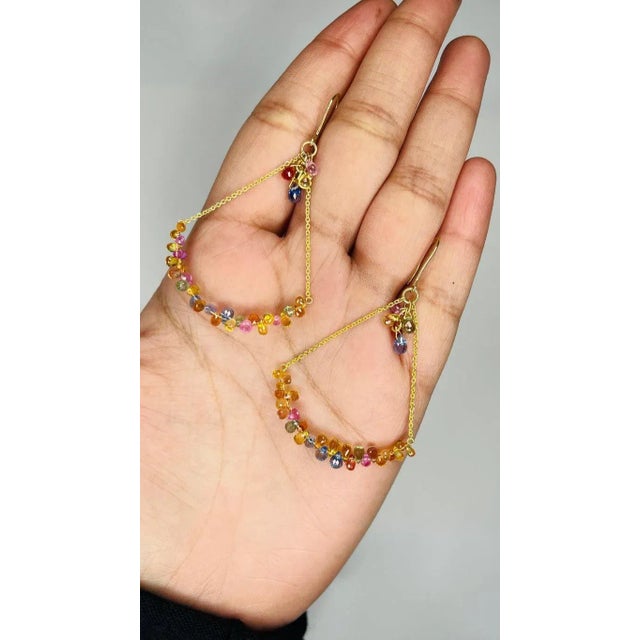 Multi Sapphire Dangle earrings to make a statement with your look. These earrings create a sparkling, luxurious look...