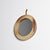 Circular glazed stoneware mirror made in France around 1970. The thick ceramic frame has a matte finish with natural...