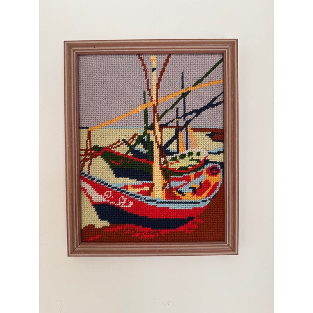 This pair of framed vintage needlepoint boats is adorable for a child’s space or otherwise. This pair will add warmth,...
