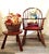 This authentic vintage child-sized sack-back Windsor rocking chair and coordinating footstool set was bench-crafted in the...