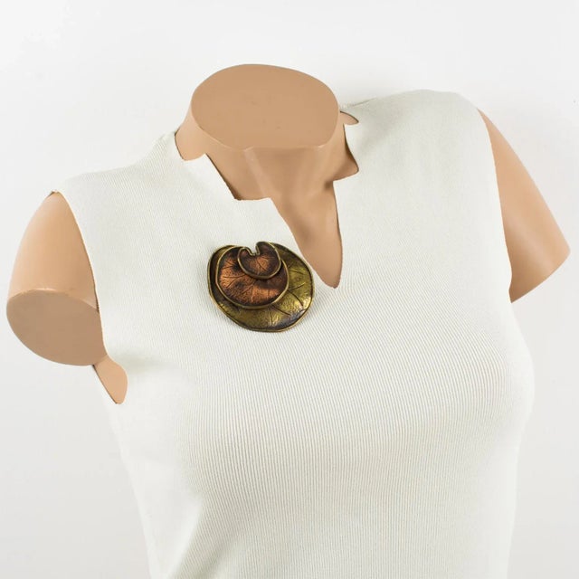 This is part of Chairish’s Costume Jewelry assortment. This lovely floral pin brooch was designed by Fabrice, Paris, and...