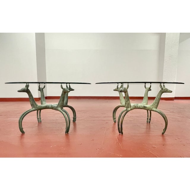 Rare sculptural deer form cast bronze table bases in the style of Armand Albert Rateau. French. Circa 1960s. Presents a...