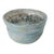 This vintage studio art pottery bowl is wheel-thrown in terra cotta and finished with a fluid baby-blue drip glaze that...