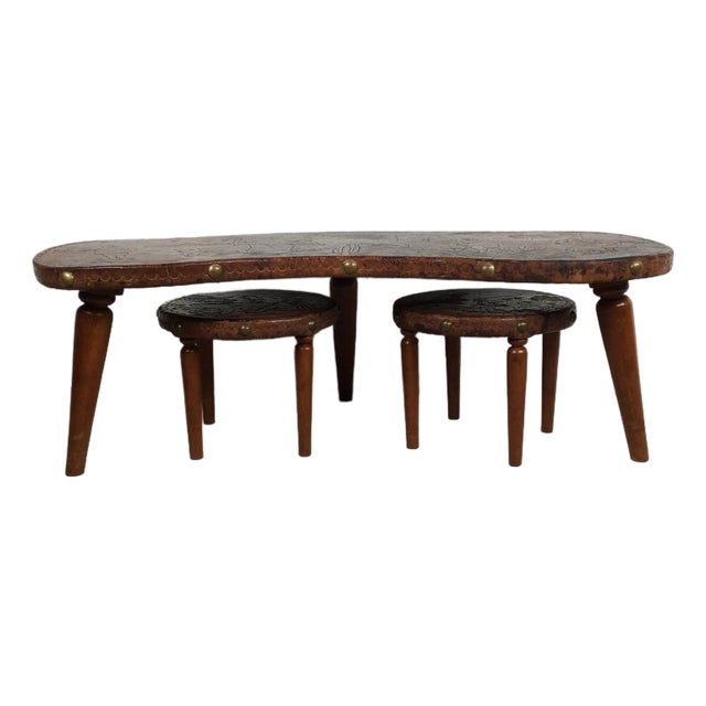 Mid Century Modern Embossed Leather and Teak Coffee Table and Matching Stools For Sale