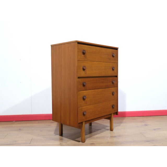This gorgeous mid century dresser exemplifies the timeless appeal of mid century style, crafted from rich vintage teak for...