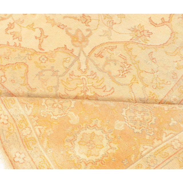 A radiant example of early 20th-century Anatolian artistry, this 1920s Antique Turkish Oushak rug exemplifies the timeless...