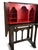 An exceptional Spanish Revival writing cabinet that blends Old World craftsmanship with dramatic architectural styling....