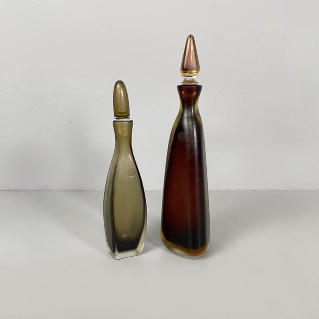 Italian modern Red and gray Murano glass bottles with cap by Venini, 1990s Pair of Murano glass decorative bottles with...