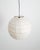 A rare and iconic mid century "30d" round ceiling pendant lamp in washi paper and bamboo by isamu noguchi produced and...