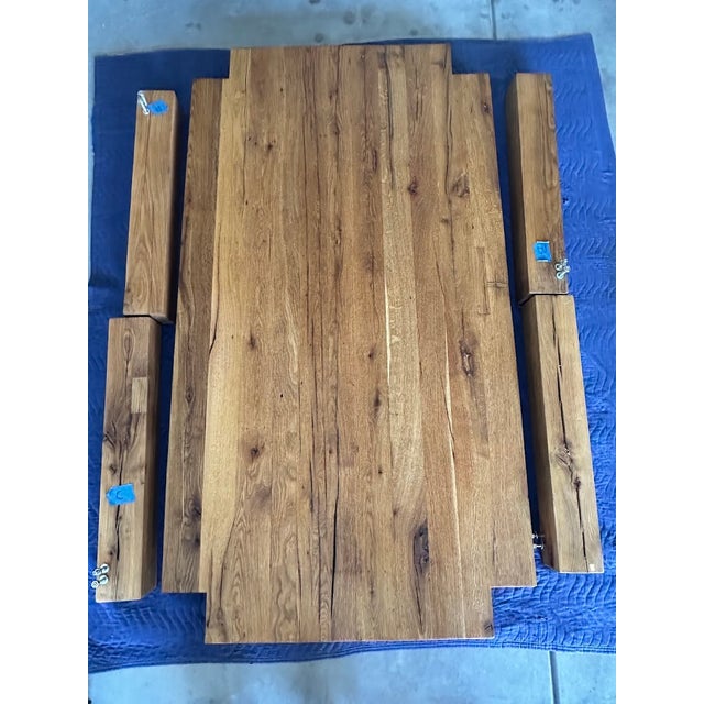 Dining table from Restoration Hardware, collection Reclaimed Oak Parsons. Condition is Like New (we had it refinished...