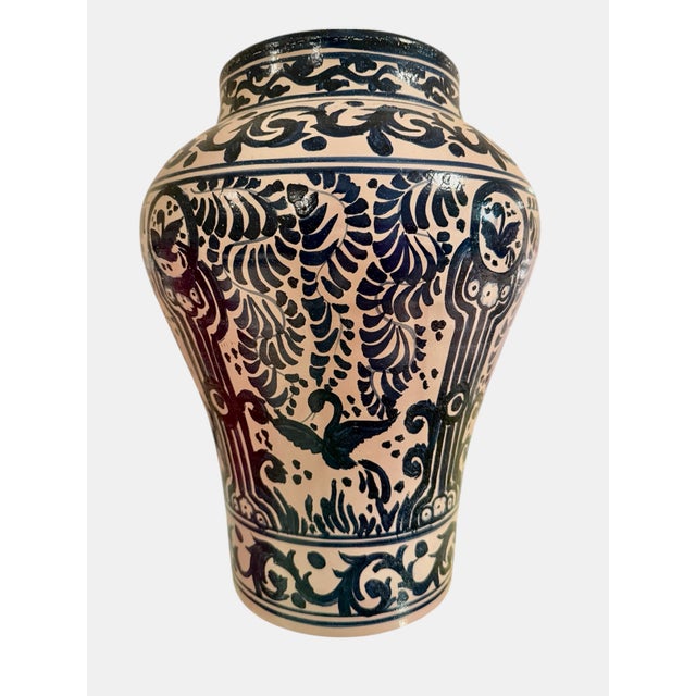 A set of four blue and white majolica vessels from Guanajuato, Mexico, sourced from the Holly Hunt showroom in Chicago....