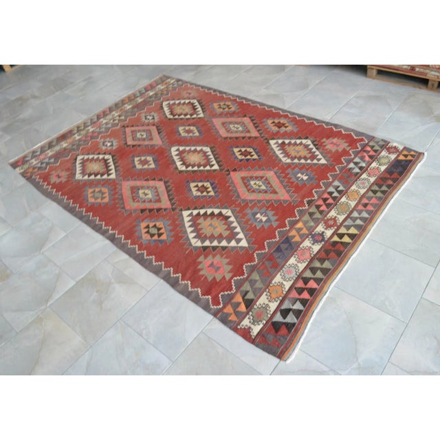 This is a vintage Turkish Antalya diamond patterned Kilim rug, made from hand spun wool on cotton. The rug is in very good...