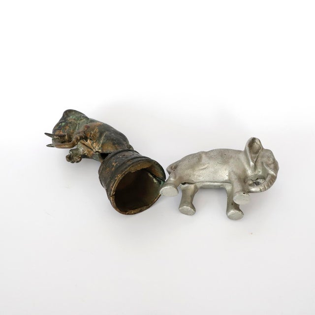 Pair of Antiques money box / bank, elephants. One of them circa 1920, made in iron, the other circa 1960 made in aluminium.