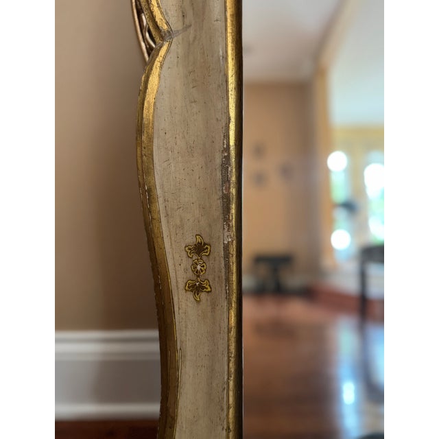 Beautiful solid wood Florentine style wall mirror by Freidman Brothers. Includes original tag on back. Cream frame with...
