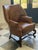 Stunning pair of Ferguson Copeland, Ltd. leather armchairs featuring rich cognac leather, classic nail head trim, and...